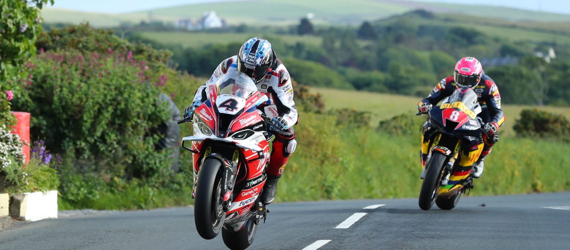 30/05/2022: Ian Hutchinson (1000 BMW/Milwaukee BMW Motorrad) and Davey Todd (1000 Honda/Milenco by Padgett’s Motorcycles) at Rhencullen during Tuesday evening’s qualifying session for the Monster Energy Isle of Man TT. PICTURE BY DAVE KNEEN/PACEMAKER PRESS.